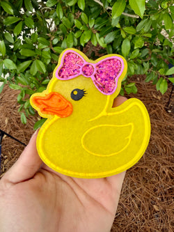 Duck with bow
